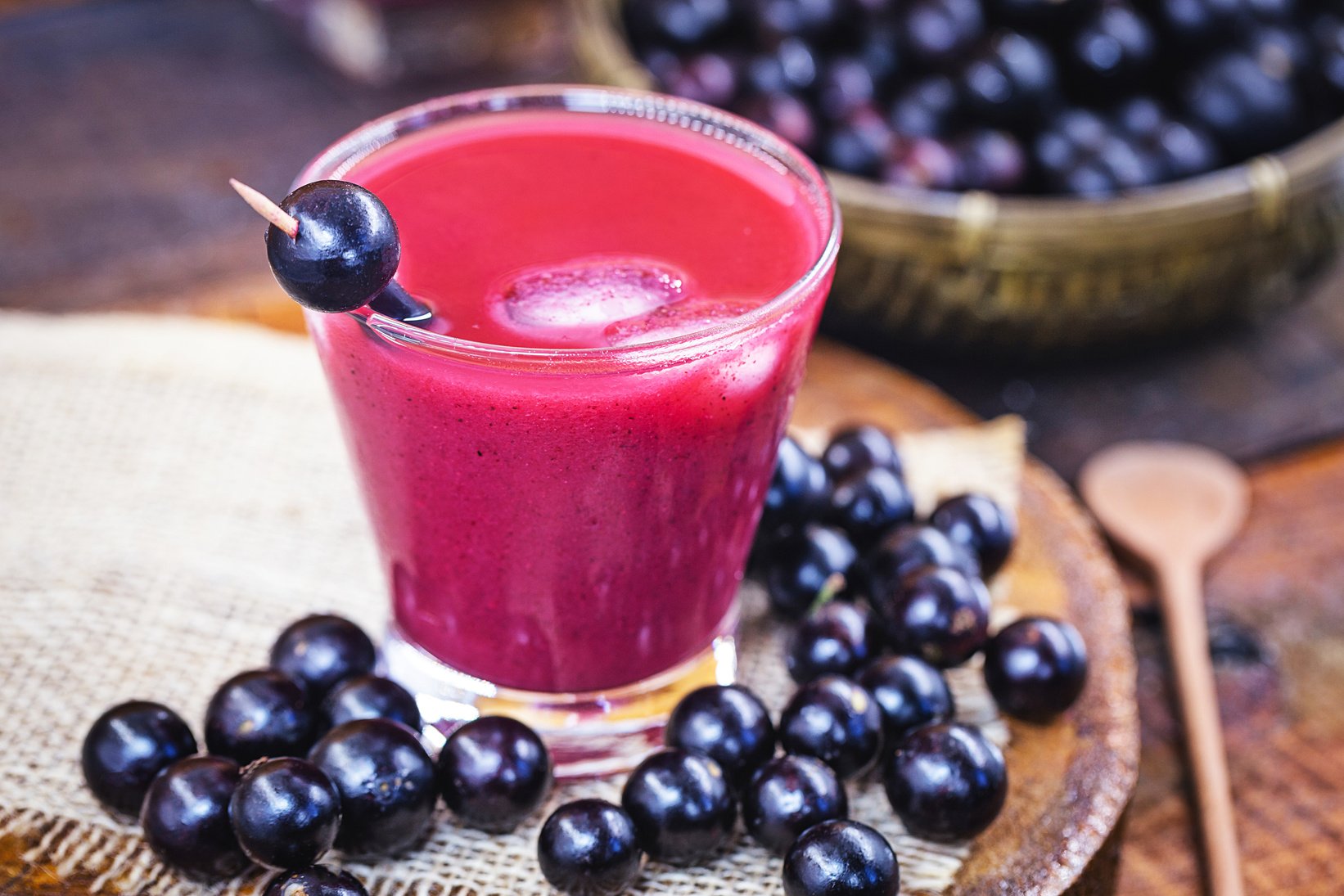 Jabuticaba juice, fruit also known as jaboticaba. Natural and organic juice, extracted directly from the fruit. Brazilian exotic fruit juice.